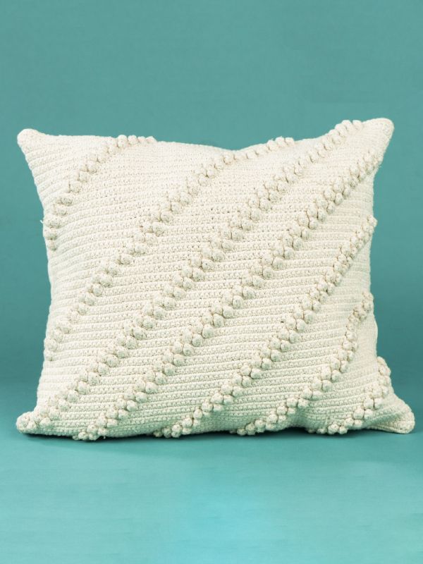 cojín de crochet bolas